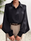 Camisa em Tecido Estruturado com Manga Lanterna e Gola Lapela – Scarllet