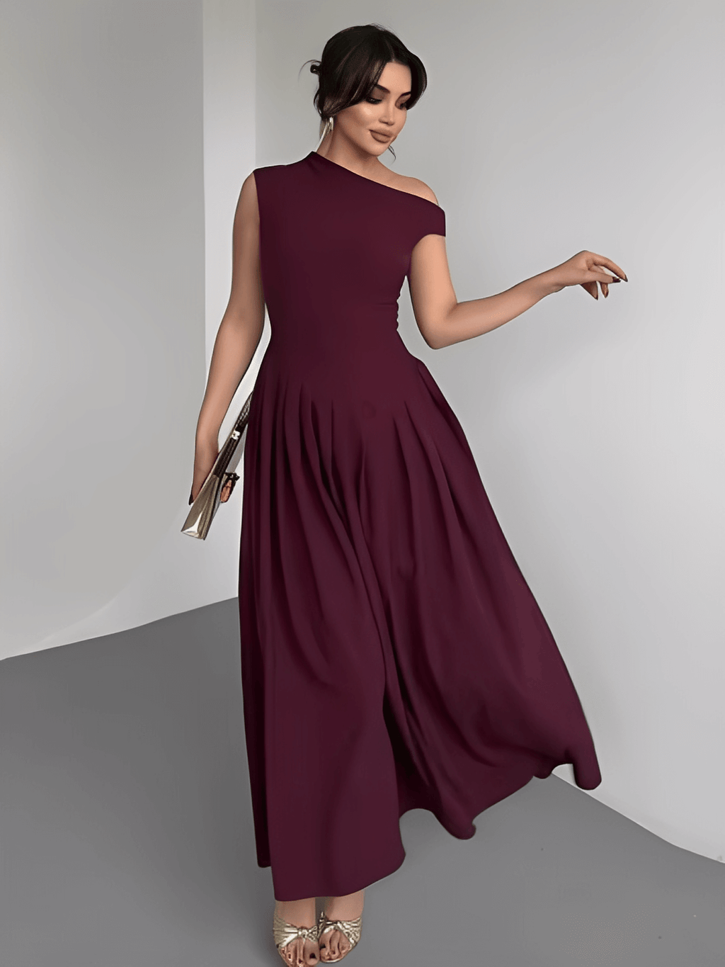 Vestido Maxi com Ombro Assimétrico e Saia Plissada Sofisticada – Luana